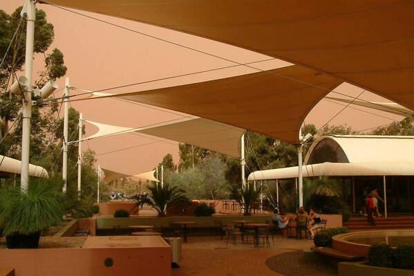 photographer Bitten by the Bug uncategorized  photo. this photo was taken at ayers rock resort not far from the famous rock known as uluru or ayers rock  as you can see the sky has turned red  this was caused by the high wind whipping up dust into the atmosphe
