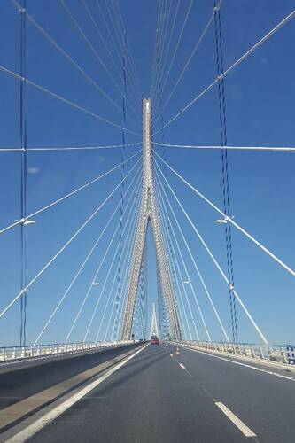 photographer Bitten by the Bug architecture  photo. le pont de normandie crosses the river seine near its mouth connecting the ports of honfleur on the south bank and le havre on the north bank  when it opened in january 1995 it was the world039s longest cable